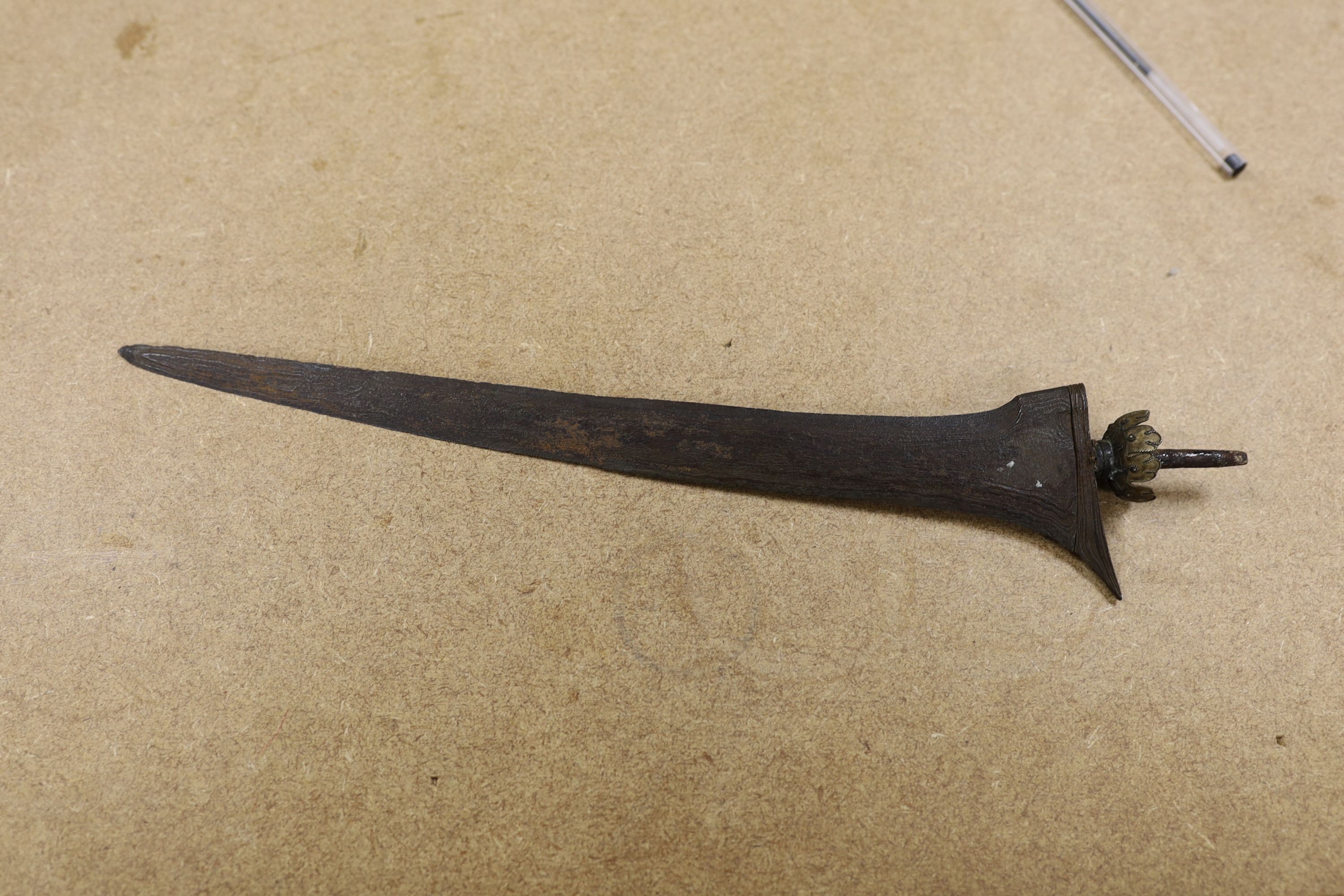 A 19th century ivory handled Kris, 40 cms long.